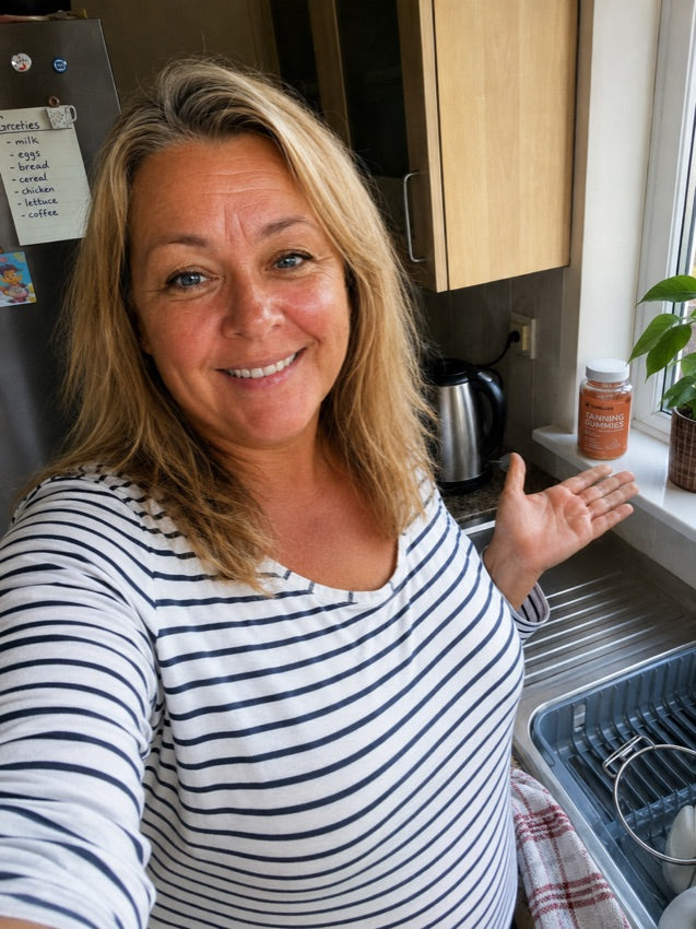 Tanluxe customer with a golden tan